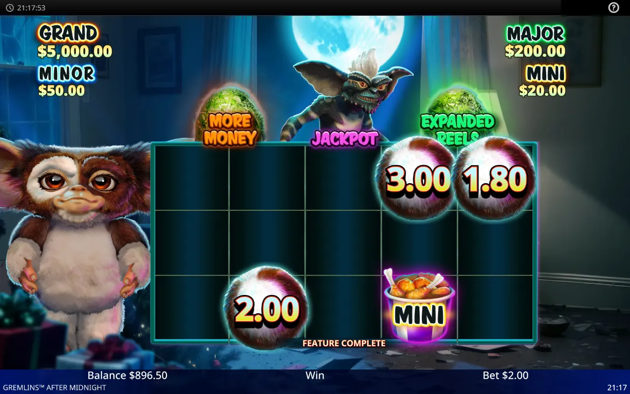 Hold and Spin board marked FEATURE COMPLETE with three Fuzz Balls worth 3.00, 1.80 and 2.00 and a MINI chicken bucket