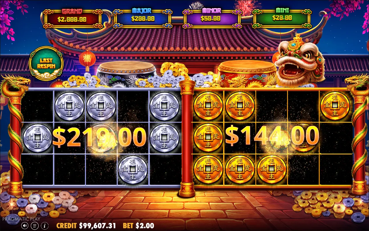 The end of the hold and spin round, silver board showing $219.00 and gold board showing $144.00, with coins covering only part of each grid