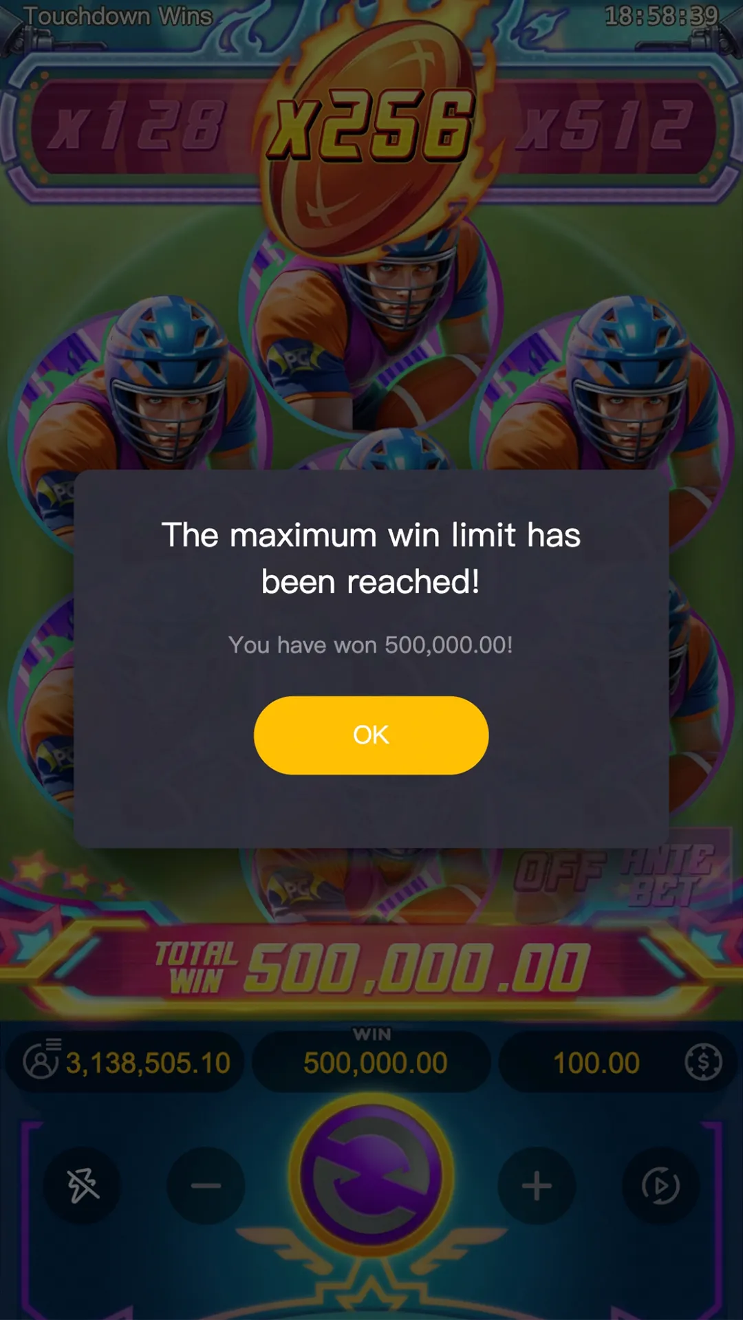 Touchdown Wins board filled with quarterback symbols at x256 with a dialog reading The maximum win limit has been reached