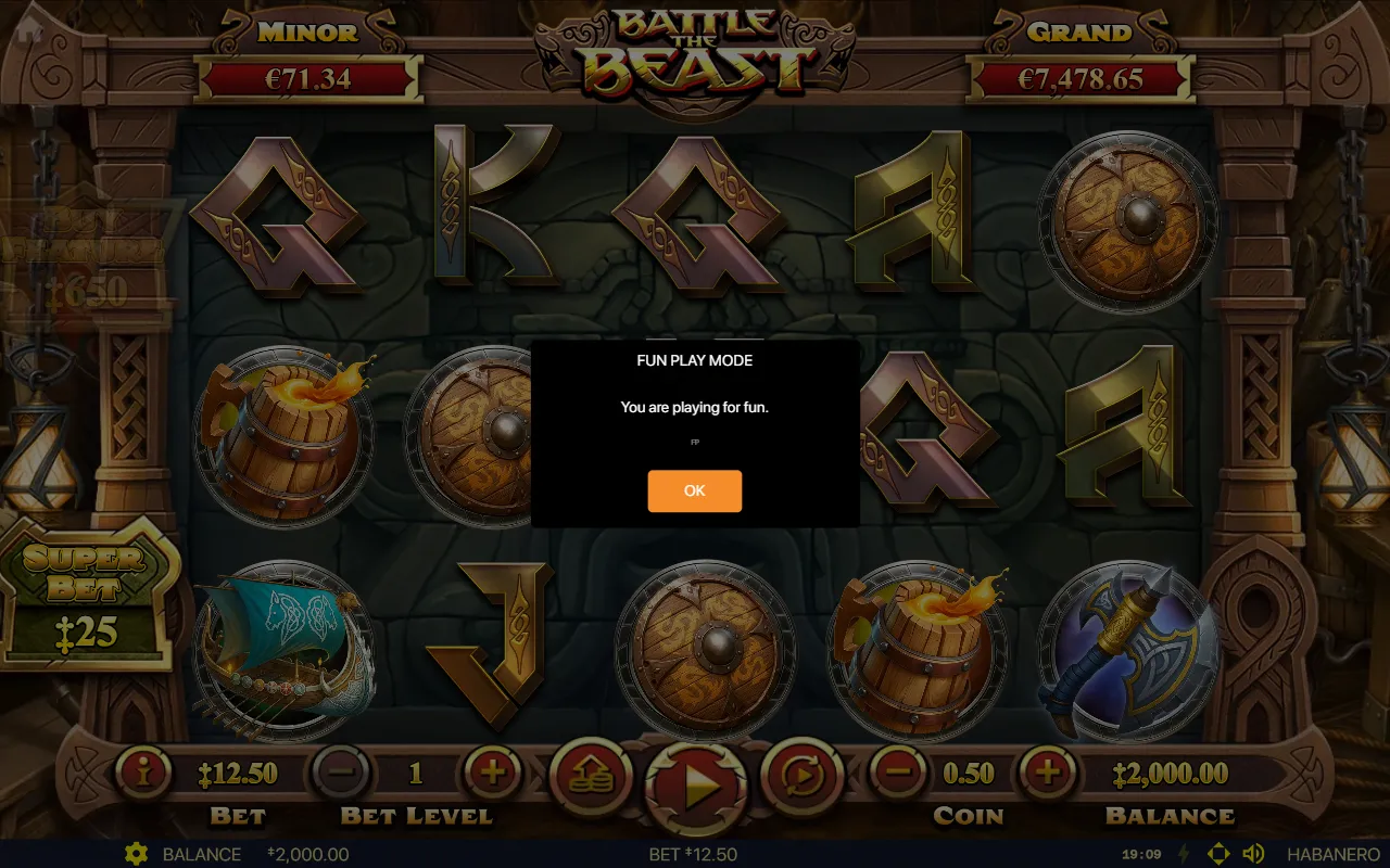 Battle The Beast 5x3 Viking slot behind a fun play mode dialog with Minor and Grand jackpot counters